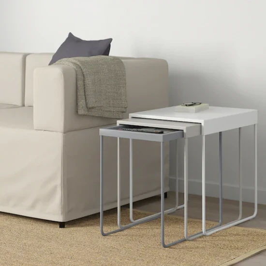 This image may contain Furniture Home Decor Table and Corner